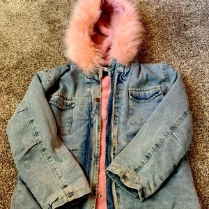 Pink and Jean jacket with fur on the inside and around the hood